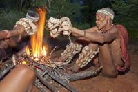 Bushmen dancing at a camp fire